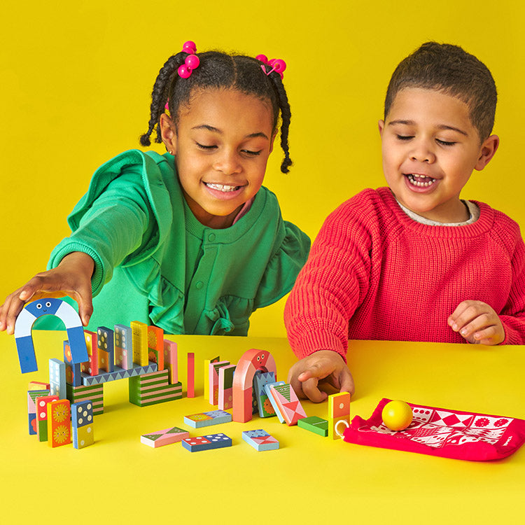 Kidoki Topple Twist Dominoes – Kikkerland Design Inc