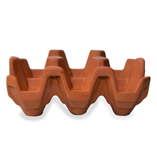 Terracotta egg racks are an ideal way to store your eggs .Designed from the traditional cardboard trays. Holds 6 eggs 
Designer: KDT 
Product Measurement: 5.5"  x 3.5"  x 2.1" 
Material: terracotta